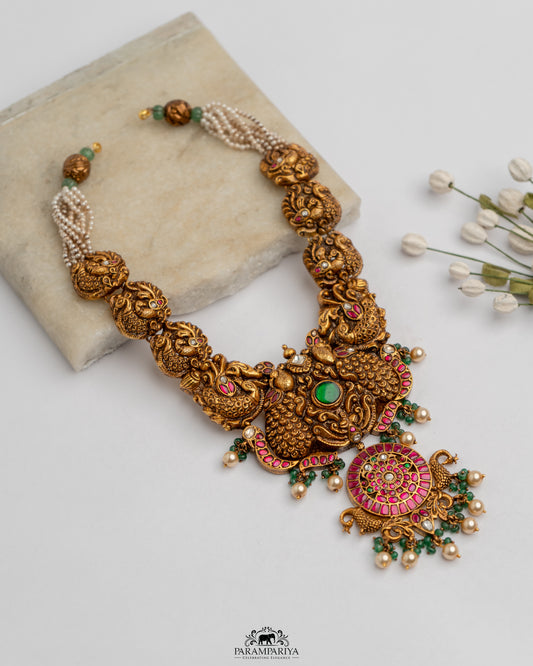 December Elegance!!

92.5 pure silver gold micron plated temple nakshi necklace with kundan stones and fresh water pearls