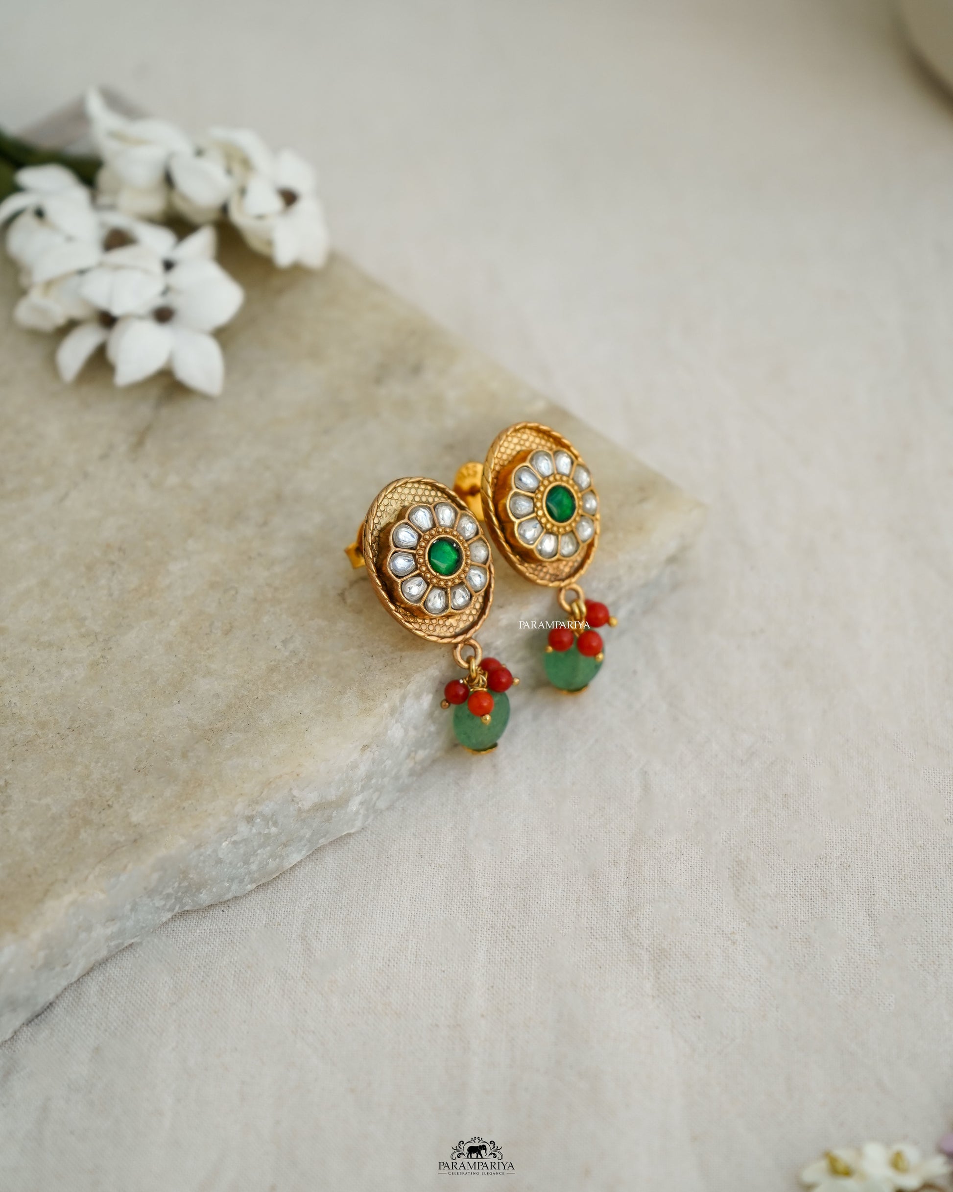 Minimal Edit!!

pure silver gold micron plated kundan inlay stud earrings.