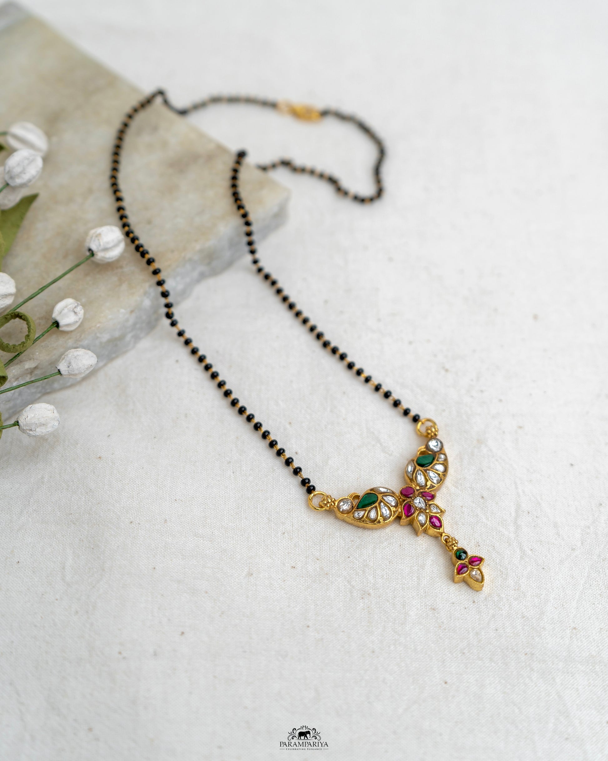 Tradition and Grace!!

Pure silver micron gold plated kundan mangalsutra to celebrate your unique story